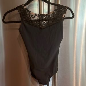 Black Luckyleo with lace top.